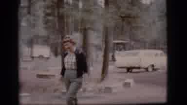 Flagstaff Arizona (1968): Woman In The Woods Walking Towards A Car And Smiling