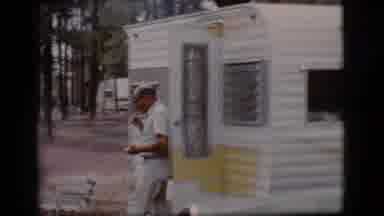 Flagstaff Arizona (1968): Man Steps Out Of Caravan Trailer In Forest