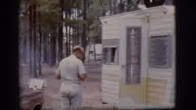 Flagstaff Arizona (1968): Man At A Campsite Opening The Door To A 1960 Style