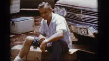 Flagstaff Arizona (1968): Embarrassed Man Reluctantly Cheers-Ing The Camera With A