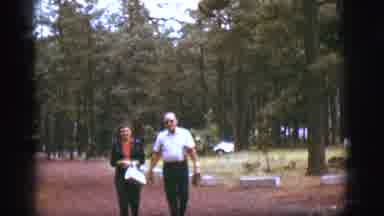 Flagstaff Arizona (1968): Elderly Man And Woman Couple Walking Through Wooded Area