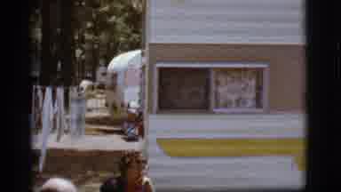 Flagstaff Arizona (1968): People Sitting In Lawn Chairs Outside A Small Camper In