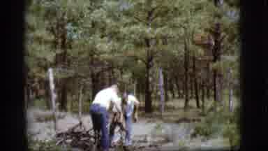 Flagstaff Arizona (1968): Men And Woman Gathering Sticks In The Woods Next To A