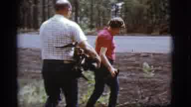 Flagstaff Arizona (1968): A Man And Woman Carry Kindling Wood From A Forest And