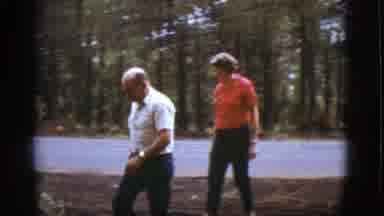Flagstaff Arizona (1968): An Older Man And Woman Walk To The Side Of Roadway In