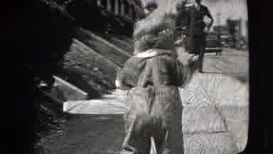 New Hampshire USA (1942): Child Toddles Along A Residential Sidewalk Toward Other