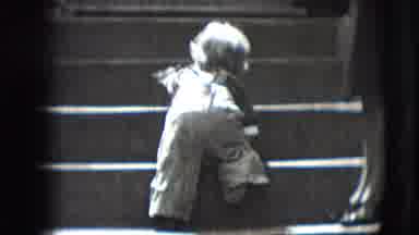 New Hampshire USA (1942): Baby Climbing Up Stairs While Still Crawling Slowly By
