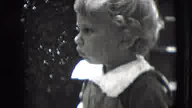 New Hampshire USA (1942): Toddler With Blonde Ringlets Wearing A Jumper With Wide