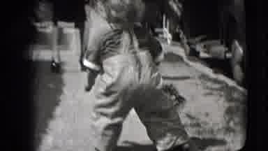 New Hampshire USA (1942): A Baby Getting Up After A Fall On The Sidewalk Wearing A