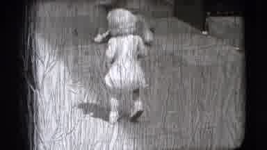 New Hampshire USA (1942): Baby Takes First Steps Down A Busy Street
