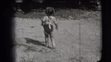 New Hampshire USA (1942): Black And White Toddler In A Bathing Suit Running Across