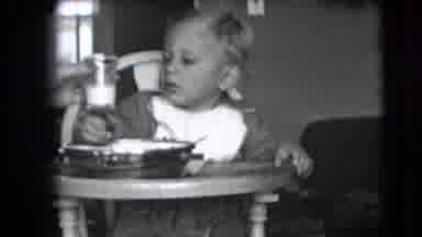 New Hampshire USA (1942): A Child Being Offered Food And Eating In A High Chair