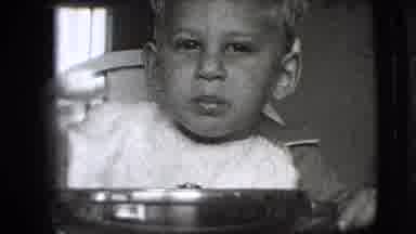 New Hampshire USA (1942): Kid Eating Offering Food To Person Recording