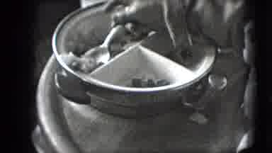New Hampshire USA (1942): A Baby Eats With A Spoon Out Of A Divided Plate