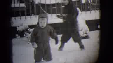 Buffalo New York (1944): Two Children Bundled Up In Thick Winter Clothing Outside