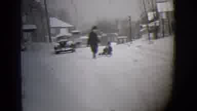 Buffalo New York (1944): An Adult Pulling A Sled In The Snow With Two Kids In The