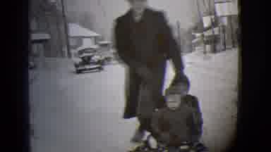 Buffalo New York (1944): Man Pushing Two Little Boys On A Sled Down A Snow Covered