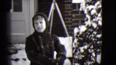 Buffalo New York (1944): Child In Black And White Film Chewing Gum In Winter Scene