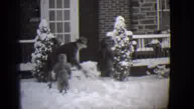 Buffalo New York (1944): Man Shoveling Snow Off The Walkway To The House As His