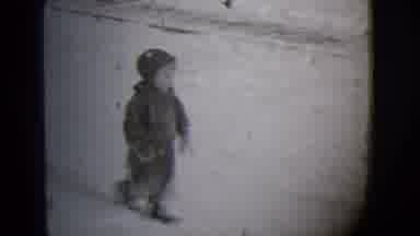 Buffalo New York (1944): Toddlers In Snowsuits Walking Outside On A Snowy Day