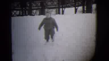 Buffalo New York (1944): Little Kid Walks On Snow And Another Kid Lies On Sled