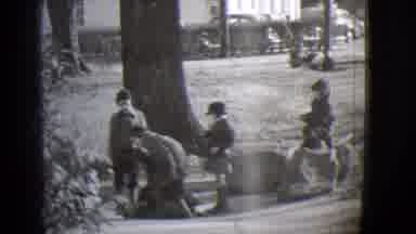Buffalo New York (1944): Four Boys Standing Near One Boy That Is Laying On The