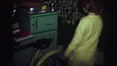 Lynbrook New York USA-1976: Children Waking Up Observing Gifts Near Lighted Tree