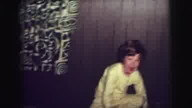 Lynbrook New York USA (1976): Young Smiling Boy Wearing Yellow Eagerly Opens