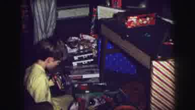 Lynbrook New York USA (1976): Three Boys Wearing Pajamas Are Opening Gifts On
