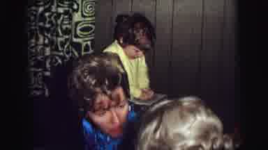 Lynbrook New York USA (1976): Little Boy In A Yellow Onesie Playing With A Bicycle