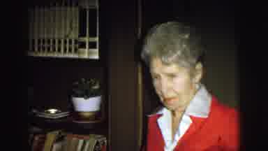 Lynbrook New York USA (1976): Two Older Women Talking Walking Living Room Bookcase