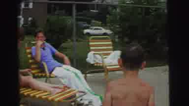 Yellowstone Wyoming USA (1971): A Young Boy In Yellow And Black Striped Trunks