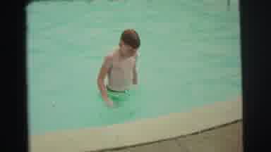 Yellowstone Wyoming USA (1971): Young Boy Learning To Swim And Experiencing The