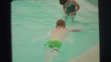 Yellowstone Wyoming USA (1971): Young Boy And Girl Play And Jump Around In