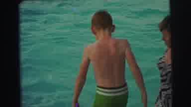 Yellowstone Wyoming USA (1971): One Boy Jumps Into The Water As One Boy Leaves The
