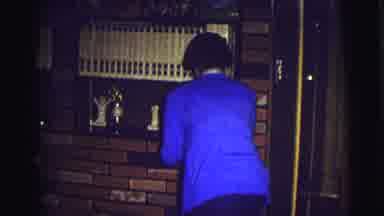 East Lansing Michigan (1972): Three Women Entering A Room One Who Hangs A Stocking