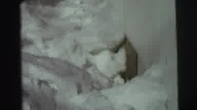 East Lansing Michigan (1972): A Snow Covered White Wooden House On A Clear Winter