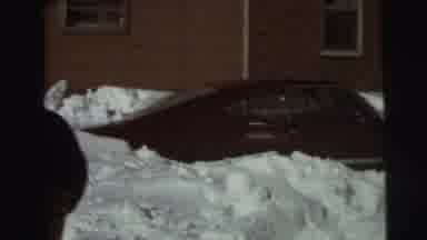 East Lansing Michigan (1972): Snow-Covered Street On A Cold Day With Many