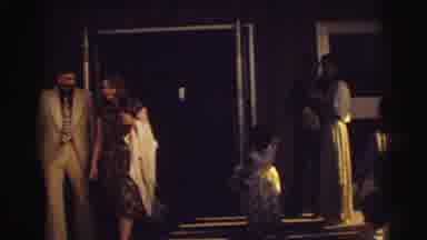 East Lansing Michigan (1972): Women Man Party Group Exchange Walk Indoors White