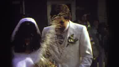 East Lansing Michigan (1972): Wedding Guests Throw Rice At Bride And Groom As They