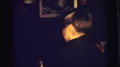 Superior Wisconsin (1973): Boy Wearing Black Coat Removes Christmas Stocking From