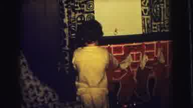 Superior Wisconsin (1973): Kid Checking Their Stocking During Christmas