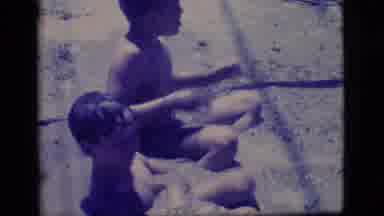 Ely Nevada (1968): Two Children Playing In A Water Pit