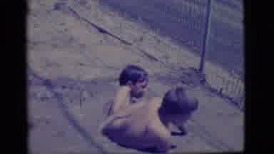 Ely Nevada (1968): Boy Struggles To Extricate Himself From Mud Pit As Another Boy