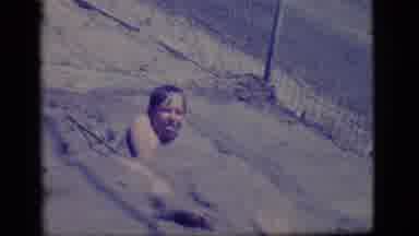 Ely Nevada (1968): Old Footage Of Two Young Boys Playing In The Mud Outside With A