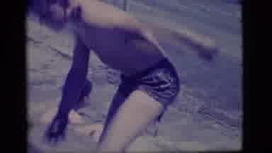 Ely Nevada (1968): Boy Playing In A Mud Hole Full Of Water Cuts To Second Boy