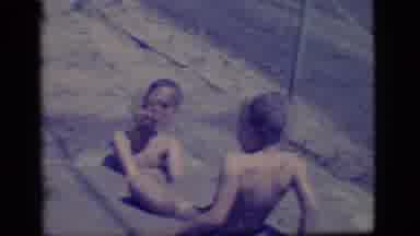 Ely Nevada (1968): Kids Playing In Water Puddle
