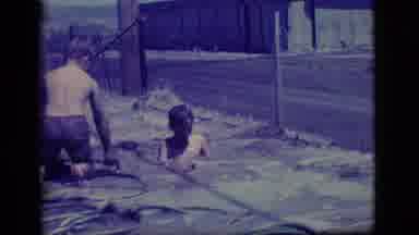 Ely Nevada (1968): As Shown There Are Two Young Boys Refreshing Themselves By
