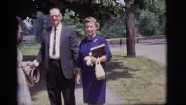 Des Moines Iowa (1966): Two Women Carrying Purses Are Well Dressed Standing Next