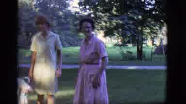 Des Moines Iowa (1966): Two Women And Boys Outside In Shady Park Waving To The
